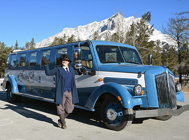 exterior of tour van, with driver